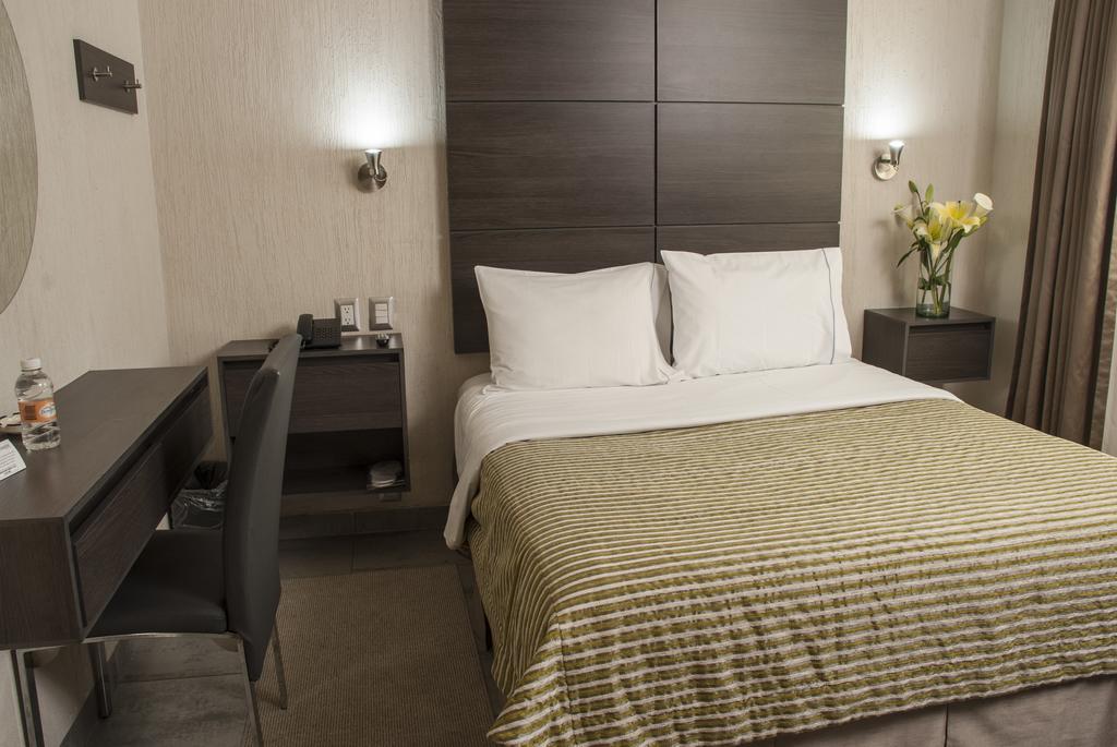 Habitación con cama grande